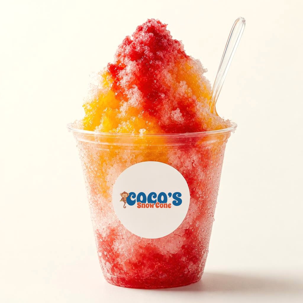 A finished Coco's snow cone with strawberry and mango syrup and the Coco's label
